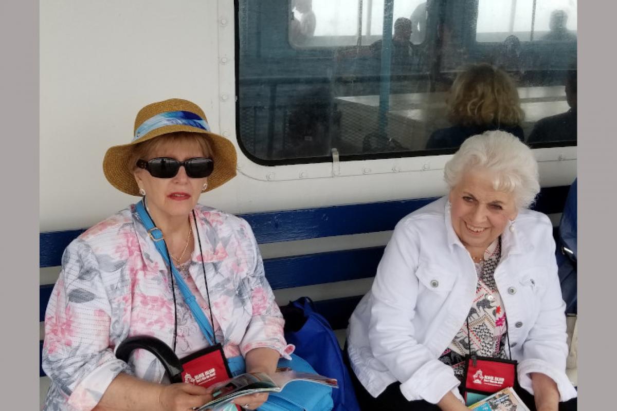 Two Women Sitting on a Bench