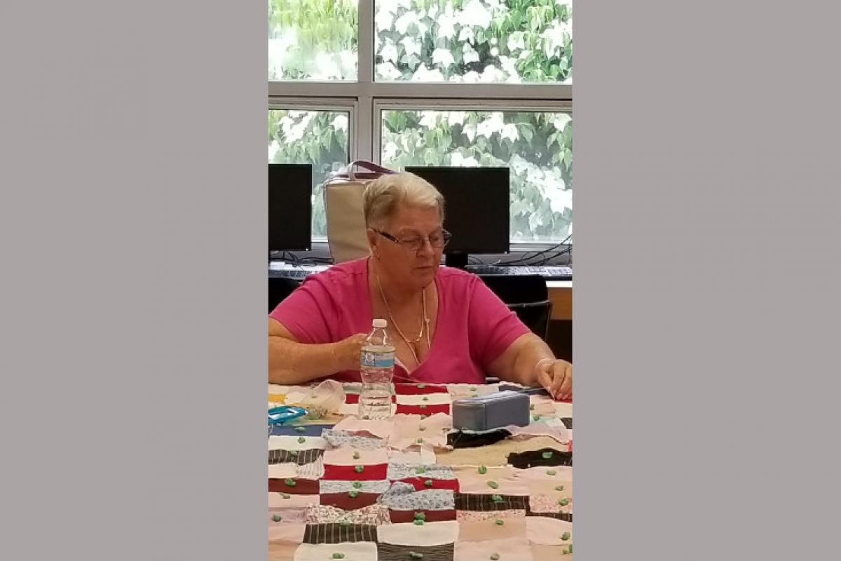 Woman Quilting